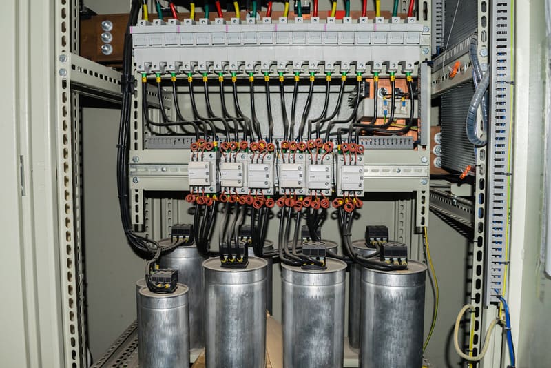 What is a compensating capacitor 1